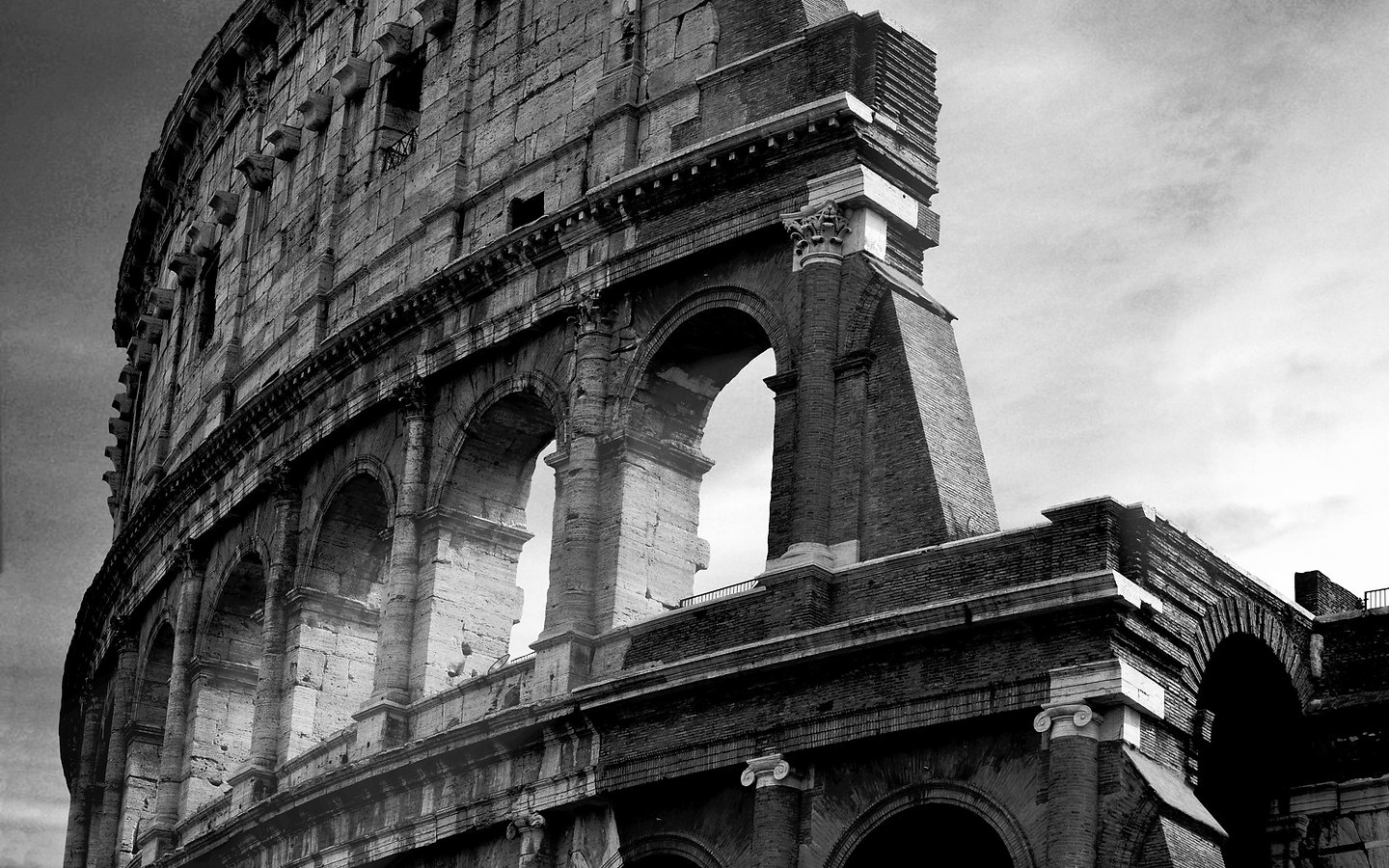 Black and white image of the Roman Colosseum symbolizing strength and enduring legacy.